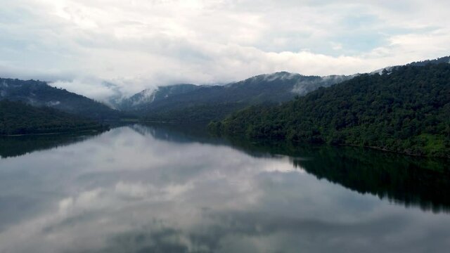 Aerial view move at calm scenery of lake at Batu Dam at Selangor