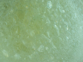 Abstract texture of soap bubbles on colorful background with selective focus.