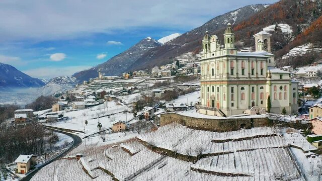 Aerial 4K, village of Tresivio in Valtellina, Italy, Church of Santa Maria di Loreto