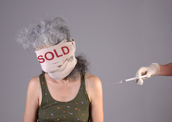 Muzzled woman forced to get vaccination