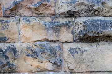 Texture of a stone wall. Old castle stone wall texture background. Part of a stone wall, for background or texture.