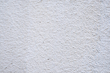 White roller painted wall with texture pattern