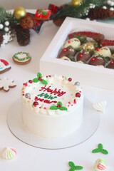 Celebration New Year Shortcake, decorated with gingerbread and fresh berries, on light background.