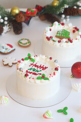 Celebration New Year Shortcake, decorated with gingerbread and fresh berries, on light background.