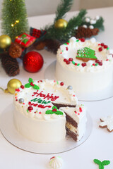 Celebration New Year Shortcake, decorated with gingerbread and fresh berries, on light background.