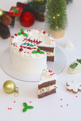 Celebration New Year Shortcake, decorated with gingerbread and fresh berries, on light background.