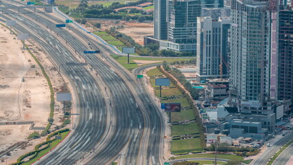 Aerial view of Al Khail road busy traffic near business bay district timelapse
