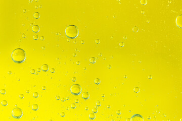 Golden yellow bubble oil,Oil & Water - Abstract Background Green Macro