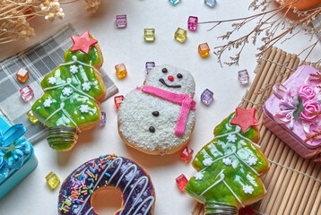 Dessert and snack in Christmas theme on the white floor