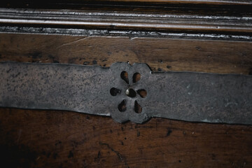 Metal detail on an old window. Metal antique iron.