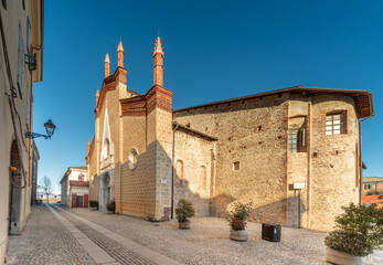 Fototapeta na wymiar Cuneo, Italy - December 11, 2021: Monumental complex of San Francesco former church now a place of cultural activities and houses the headquarters of the Civic Museum in via Santa Maria