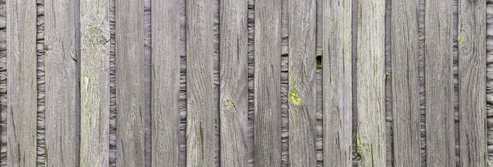 Fototapeta Naturalne Tło starej obdartej z farby ściany z drewnianych desek.	 obraz