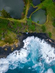 Aerial long exposure view of waves crashing on the south coast of Mauritius island