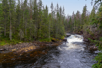 Gåfossen waterfall near the village of Maura in Norway