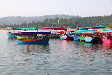 colorful boats park at river bank of at dudhni- Gujarat- India