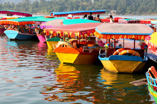 colorful boats park at river bank of at dudhni- Gujarat- India