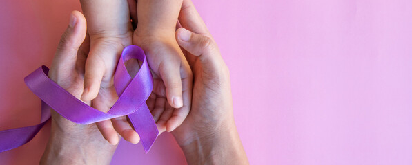 Adult and child hands holding purple ribbons, Alzheimer's disease, Pancreatic cancer, Epilepsy...