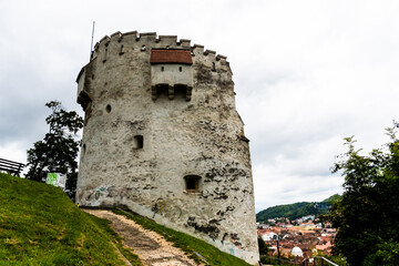 Fototapeta na wymiar White tower (Turnul Alb) is a fort of Brasov from the XV century. Brasov, Romania.