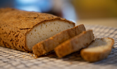 Sliced gluten-free bread on a kitchen towel. Healthy food concept