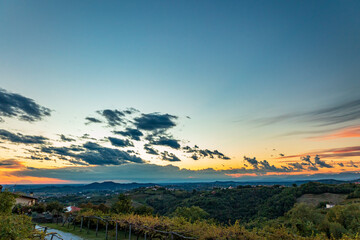 Colorful sunset in the vineyards at the border between Italy and Slovenia