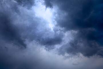 Obraz premium Big summer storm clouds. Worsening weather. Natural abstract background.