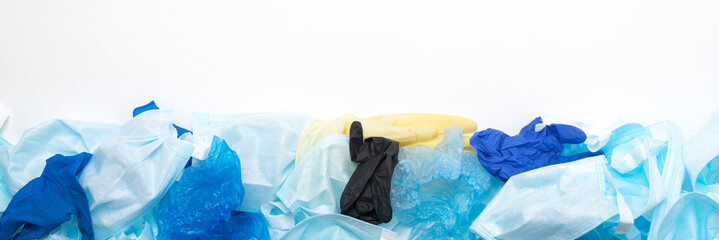 Waste of used personal protective equipment PPE gloves, disposable masks, shoe covers of medical...