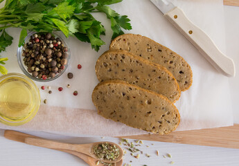 seitan or vegan meat sliced with spices such as oregano, pepper, garlic and parsley. Top view