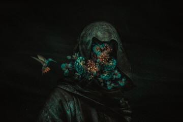 dark flowers in face with an kolibri on the side