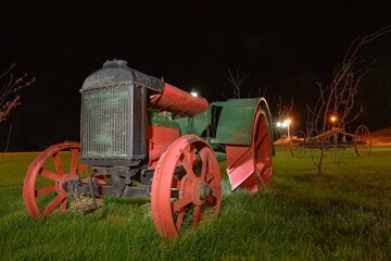 Antique tractors restored for decoration. - obrazy, fototapety, plakaty