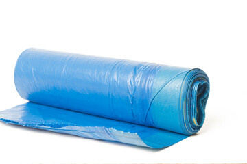 blue plastic disposable garbage bags roll package isolated on white background side view