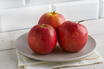 cripps pink apples on white background