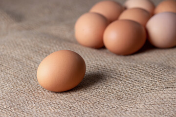 fresh eggs on jute cloth