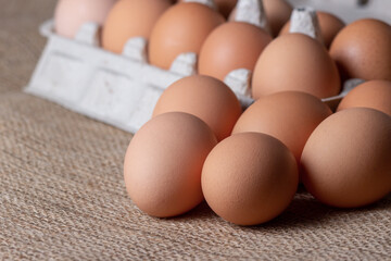 fresh eggs on jute cloth