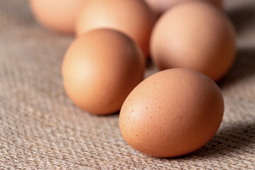 fresh eggs on jute cloth