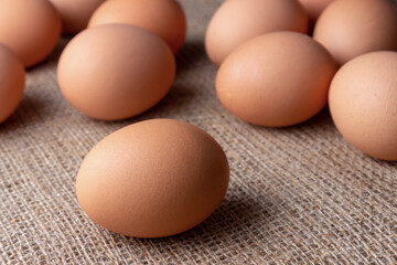 fresh eggs on jute cloth