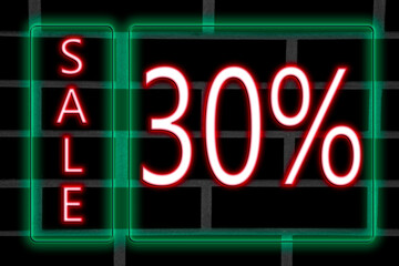 Pink neon inscription 30 percent discount in green neon frame on brick wall background