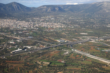 Airplane view from high altitude of Athens city and Attica, Greece