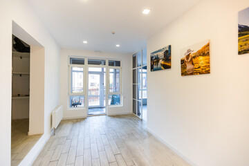 Canvas print. Photo hanging on a white wall, front view. Interior decor