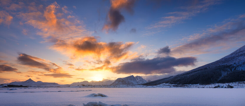 Panoramic view of the sunset sky. Winter landscape. The Lofoten Islands, Norway. High resolution photo.