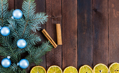 New Year's card in rustic style on a wooden background, with New Year's decorations. top view