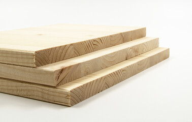 Three boards of white pine, arranged like steps.