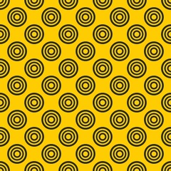 Tile vector pattern with black polka dots on yellow background