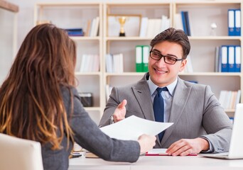 Business meeting between businessman and businesswoman