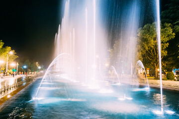 Fototapeta premium Batumi, Adjara, Georgia. Singing And Dancing Fountains Is Local Landmark At Boulevard Fountains. Night Illuminations