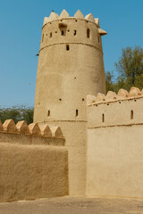 Fototapeta na wymiar Exterior and towers of the Al Jahili Fort in Al Ain, Abu Dhabi, United Arab Emirates, Arabia