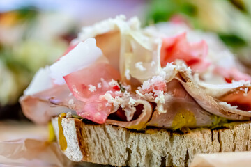 Traditional Danish sandwiches, Smorrebrod with bacon and vegetables