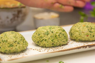 Phali is a traditional dish of Georgian cuisine made of spinach, vegetables and walnuts on the background of the flag of Georgia from the USSR