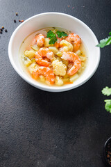 shrimp soup vegetables seafood first course healthy meal diet snack on the table copy space food background rustic. top view keto or paleo diet pescetarian