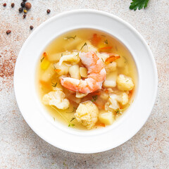 shrimp soup vegetables seafood first course healthy meal diet snack on the table copy space food background rustic. top view keto or paleo diet pescetarian