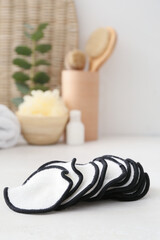 Reusable cotton pads on table